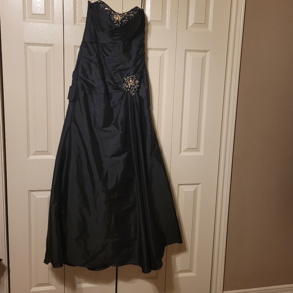 Beautiful Black with Gold and Silver embellishment, strapless/Size 8